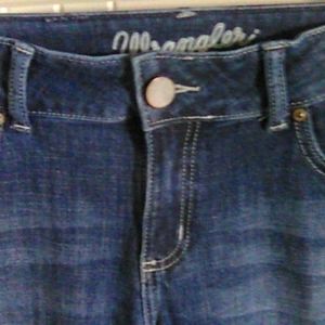 Wrangler size 9/10. Light stretch.